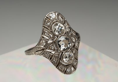 PLATINUM AND DIAMOND COCKTAIL RING.