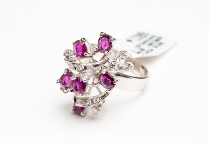 LADIES WHITE GOLD RUBY AND DIAMOND COCKTAIL RING.
