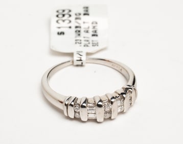 LADIES PLATINUM AND DIAMOND BAND.