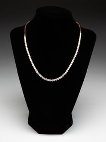 ROSE GOLD DIAMOND TENNIS STYLE NECKLACE, 10.08 CARATS.