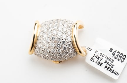 14 KARAT PAVE DIAMOND ENHANCER/PENDANT.