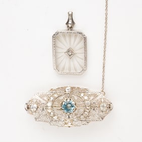 14K WHITE GOLD PENDANT AND BROOCH.