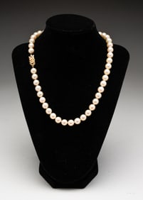 17" STRAND PEARL NECKLACE WITH 14K CLASP.