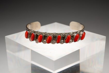 SIGNED P.D. COONSIS CORAL CUFF BRACELET.