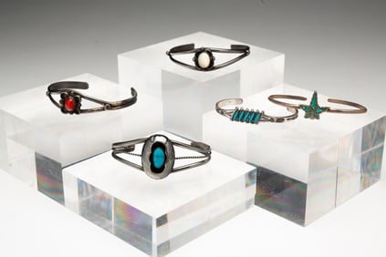 FIVE STERLING SILVER NAVAJO GESTONE CUFFS.