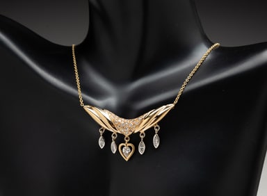 14K YELLOW GOLD DIAMOND NECKLACE WITH PENDANTS.