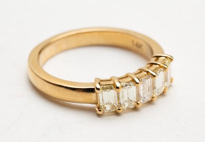 14K YELLOW GOLD DIAMOND RING.