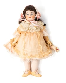 LARGE FRENCH BISQUE HEAD DOLL WITH CORK PATE AND WIG.