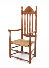 AMERICAN WALNUT AND MAPLE BANNISTER BACK ARMCHAIR.