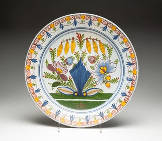 DELFT SHALLOW BOWL WITH POLYCHROME DECORATION.