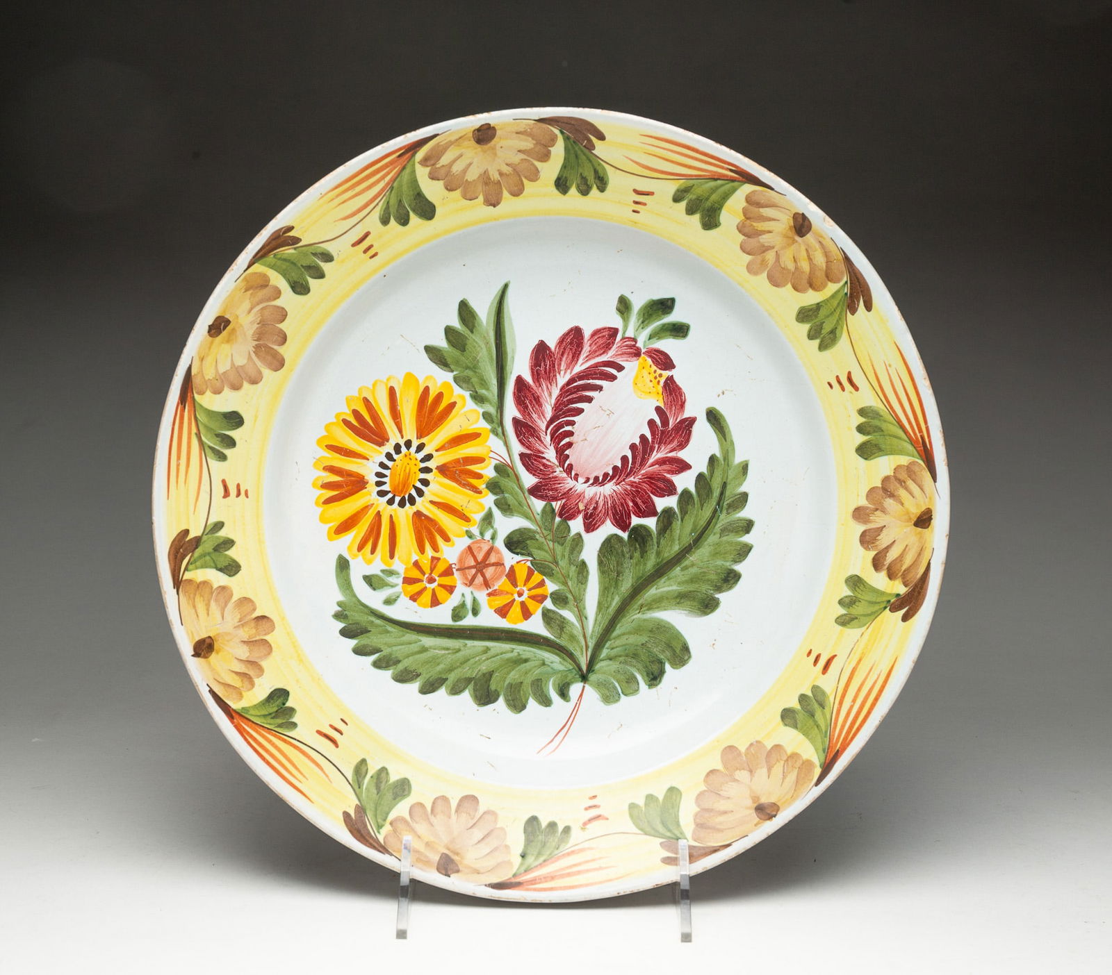 POLYCHROME TIN GLAZED FAIENCE SHALLOW BOWL. (1 of 4)