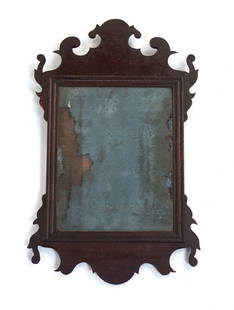 AMERICAN CHIPPENDALE FRET-CARVED MAHOGANY MIRROR.: American, ca.1800. Mahogany with pine secondary. Nicely scrolled frame with original finish and foxed mirror. 18.5"h. 11.5"w. Ex Clark Garrett (Fairhaven, Ohio)