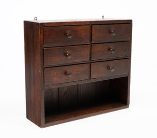 AMERICAN PAINTED PINE HANGING CASE OF DRAWERS.