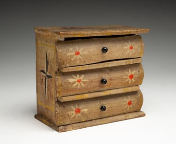 EUROPEAN FOLK ART POLYCHROMED PINE MINIATURE THREE-DRAWER CHEST.