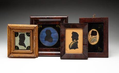 FOUR FRAMED MALE SILHOUETTES.