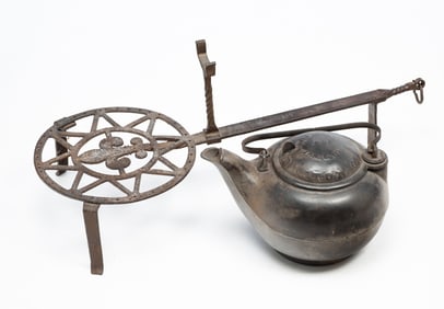 LARGE IRON KETTLE AND FIREPLACE STAND.