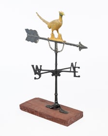 PAINTED ALUMINUM FULL-BODIED PHEASANT WEATHERVANE AND CAST IRON DIRECTIONALS MOUNTED ON BOARD.