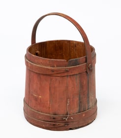 LARGE AMERICAN RED-PAINTED AND STAVED WOOD BUCKET WITH HANDLE.