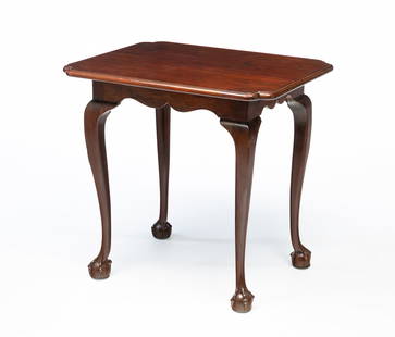 GEORGE III MAHOGANY TEA TABLE.: English, Late 18th Century. Mahogany. Top with shaped corners and routed edge, base with shaped apron, cabriole legs, elongated claw and ball feet with pegged construction. 26"h. 27"w. 21.75"d. From t