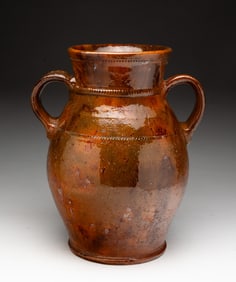 ATTRIBUTED TO JACOB MEDINGER (MONTGOMERY COUNTY, PENNSYLVANIA, 1856-1932), DOUBLE-HANDLED REDWARE