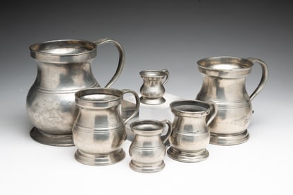 SET OF SIX ENGLISH PEWTER BELLIED MEASURES.