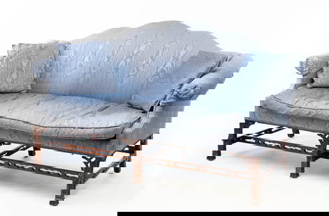 MARSHALL FIELD'S CHIPPENDALE STYLE MAHOGANY AND MOIRE-UPHOLSTERED CUSTOM-MADE SOFA.: American, 20th Century. Mahogany. Shaped back, rolled arms, down cushion, gadrooned carved beaded edge, carved square legs with lattice brackets and cutout stretchers. 21" seat ht. 20"h. 77"w.From the