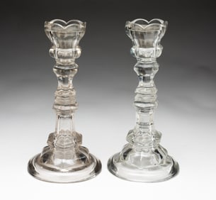 PAIR OF PITTSBURGH FLINT GLASS CANDLESTICKS WITH PEWTER INSERTS.