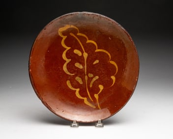 PENNSYLVANIA SLIP-DECORATED REDWARE PLATE.