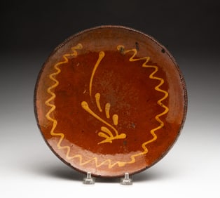 PENNSYLVANIA SLIP-DECORATED REDWARE PLATE.
