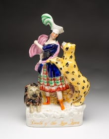 STAFFORDSHIRE "DEATH OF THE LION QUEEN" FIGURINE.