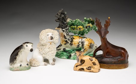 FIVE ANIMAL FIGURINES.