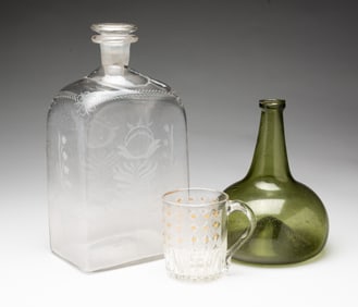 A HALF POST BOTTLE, AN ONION SHAPED BOTTLE, AND A MOLD BLOWN MUG.