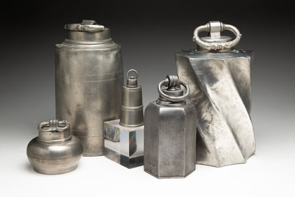 FIVE PEWTER JARS WITH THREADED HANDLED LIDS.