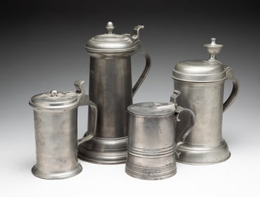 FOUR EUROPEAN PEWTER LIDDED STEINS.
