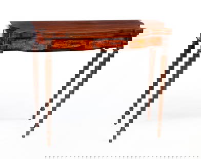 FEDERAL FLAME MAHOGANY AND STRING-INLAID CARD TABLE.: American, Early 19th Century. Mahogany with pine secondary. Shaped bi-fold top with biscuit corners and line inlays on edges, apron with flame mahogany veneered panels and center ellipse raised on sle