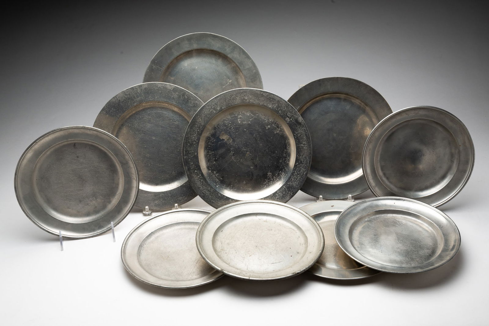 TEN PEWTER PLATES. (1 of 6)
