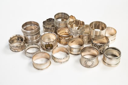 GROUP OF STERLING SILVER NAPKIN RINGS.