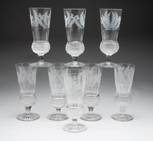 EIGHT EDINBURGH CRYSTAL "THISTLE" CHAMPAGNE FLUTES.