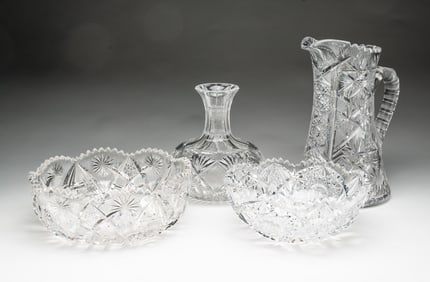 FOUR BRILLIANT PERIOD CUT GLASS VESSELS.