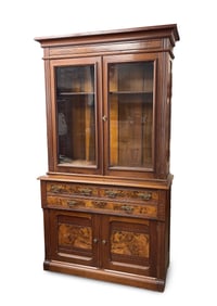 VICTORIAN WALNUT AND BURL WALNUT BOOKCASE.