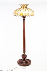 FLOOR LAMP WITH PANELED CARMEL SLAG GLASS SHADE.
