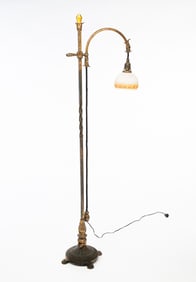 BRASS PLATED CAST IRON FLOOR LAMP.
