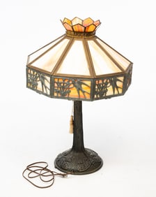 TABLE LAMP WITH PANELED SLAG GLASS SHADE.