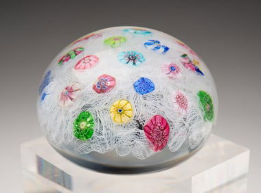 BACCARAT SCATTERED MILLEFIORI GLASS PAPERWEIGHT.