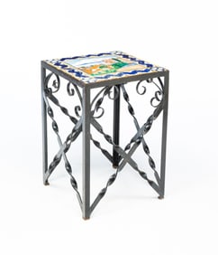 SPANISH COLONIAL STYLE WROUGHT IRON AND TILE TOP GARDEN TABLE.