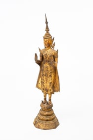 THAI GILT BRONZE STANDING BUDDHA FIGURE.