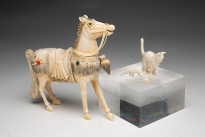 FOUR ASIAN CARVED ANIMALS.