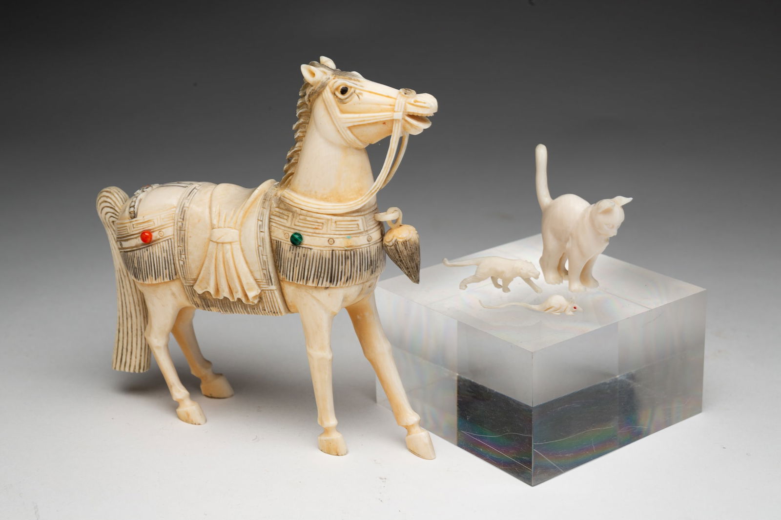 FOUR ASIAN CARVED ANIMALS. (1 of 4)