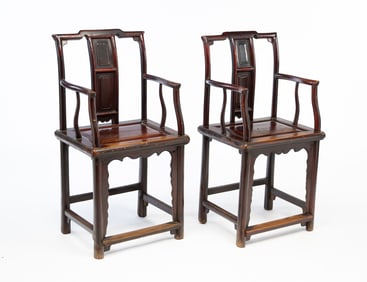 A PAIR OF RED LACQUERED CHINESE THRONE CHAIRS.