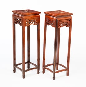 A PAIR OF CARVED CHINESE FERN STANDS.